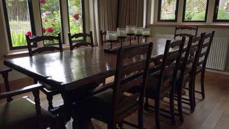 upwards tilt of a rustic dining room in a family home in slow motion