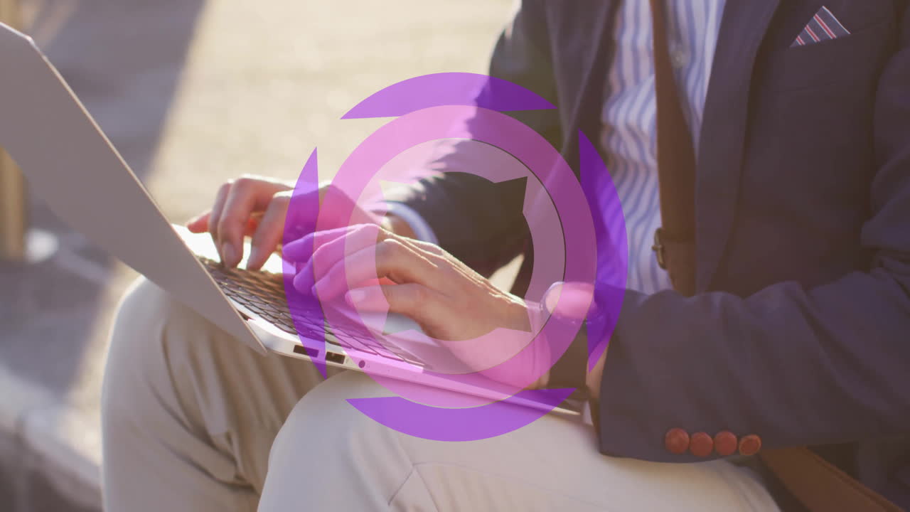 Business professional typing on laptop with purple circular animation overlay