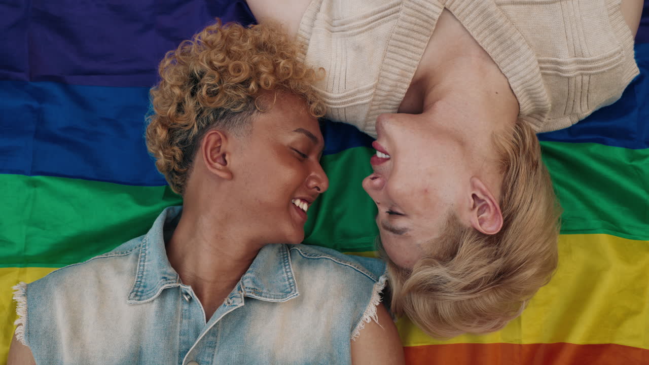 A loving LGBTQ couple celebrates their identity