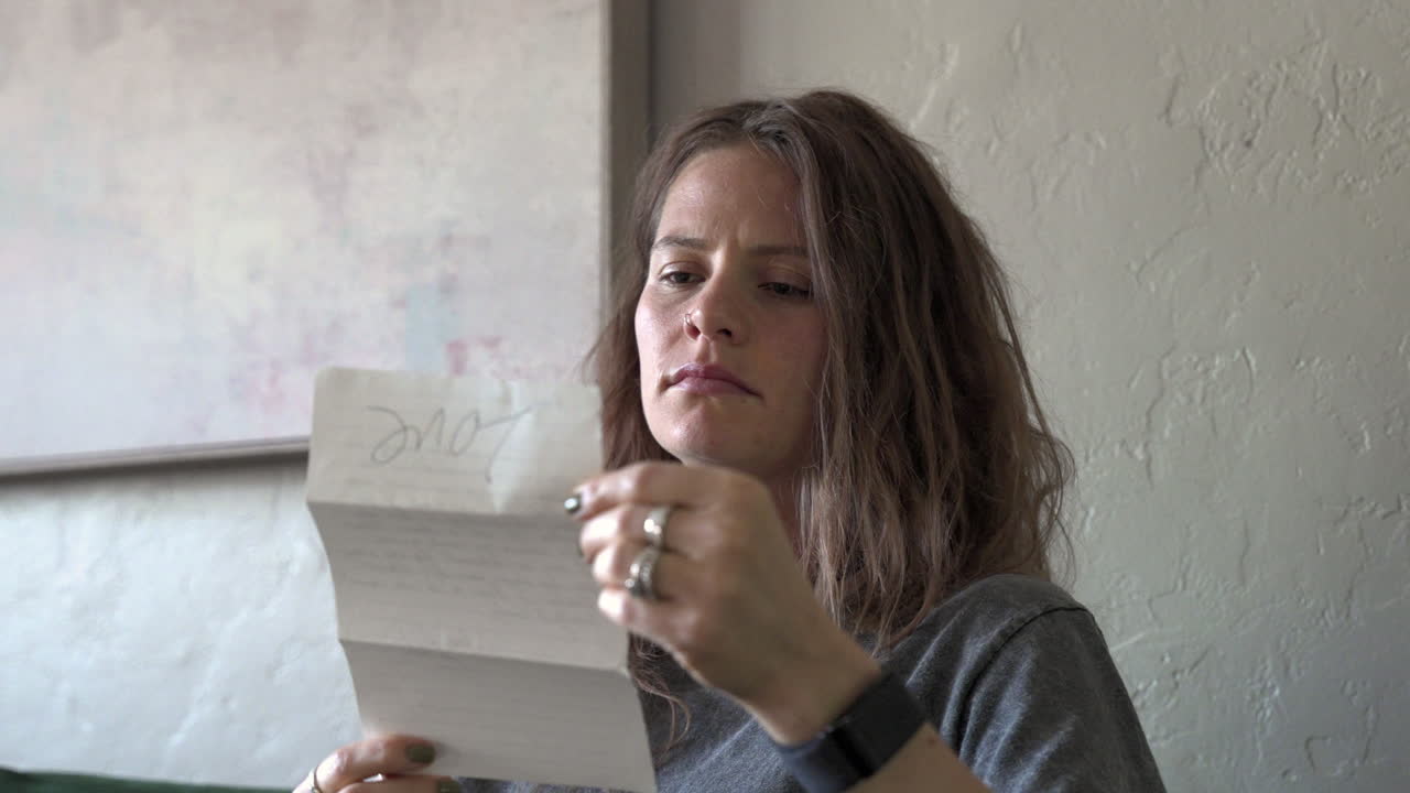 Woman Experiencing Sadness and Contemplation