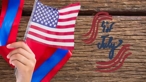 animation of 4th of july text over person holding american flag