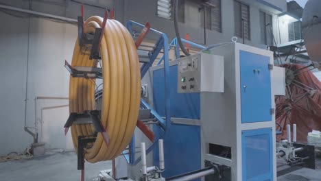 plastic pipe manufacturing process in a factory