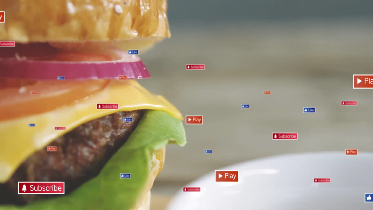 Close-up of burger with social media icons floating around in animation