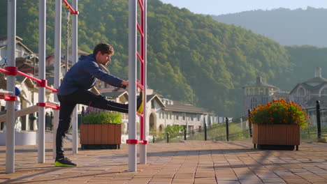 man stretching outdoors