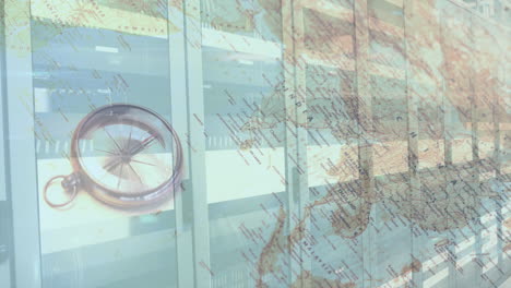 composición digital de la brújula y el mapa del mundo contra la sala de servidores de computadoras