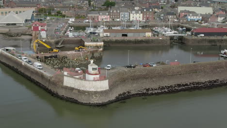 an aerial view of arbroath harbour and town on a cloudy day