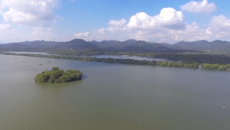 blue sky with white clouds，lake and hill  hangzhou west lake