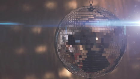 spinning disco ball reflecting light, creating festive animation atmosphere