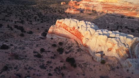 rough terrain with scenic cliffs and sandy desert at sundown in usa