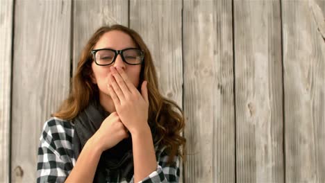 pretty girl blowing a kiss at the camera