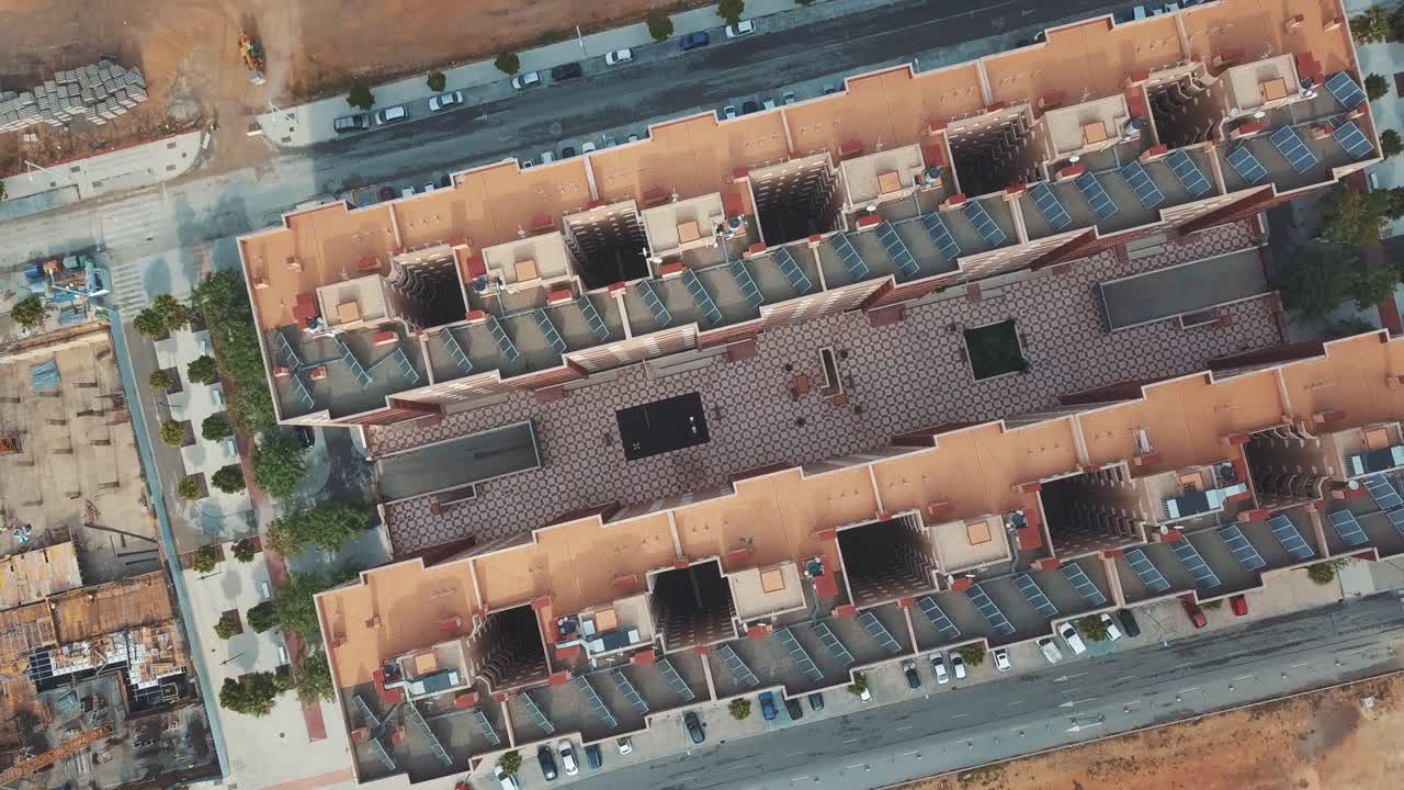 Cinematic overhead view of new buildings