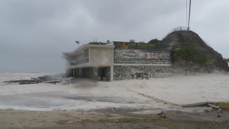 ocean foam due to rough waves in currumbin alley, queensland, australia - wide shot