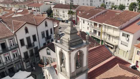 Historical-bell-tower-of-Arouca-town-in-Portugal,-aerial-orbit-view