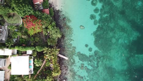 Aerial-shot-of-Les-Anses-d'Arlet-beach-picturesque-coast-line-in-the-French-West-Indies-island-Martinique