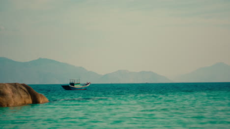 tranquil seascape with fishing boat