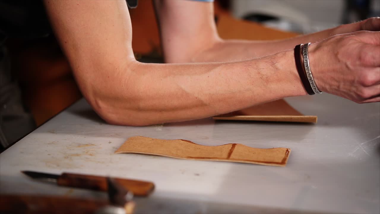 Leatherworking Process: Applying Glue to Leather