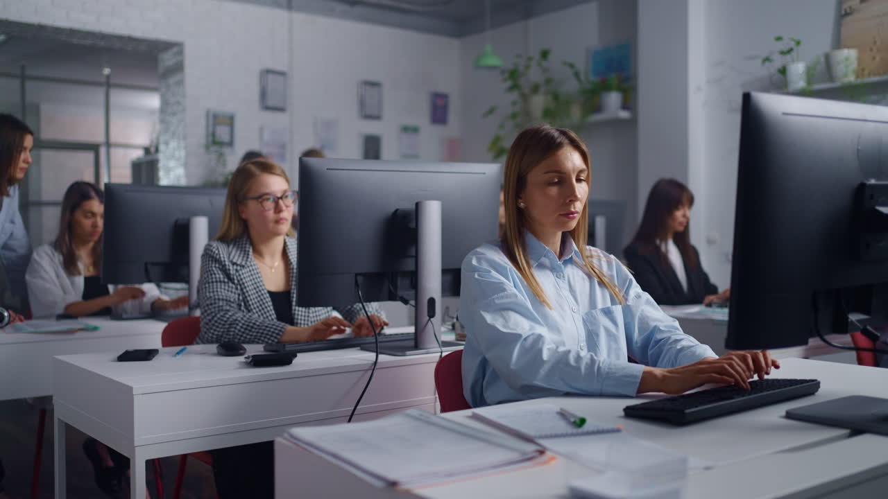Women Working on Computers in an Office