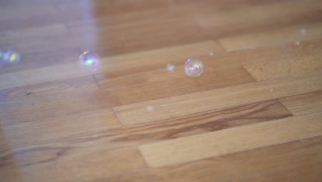 bubbles pop up from the parquet floor