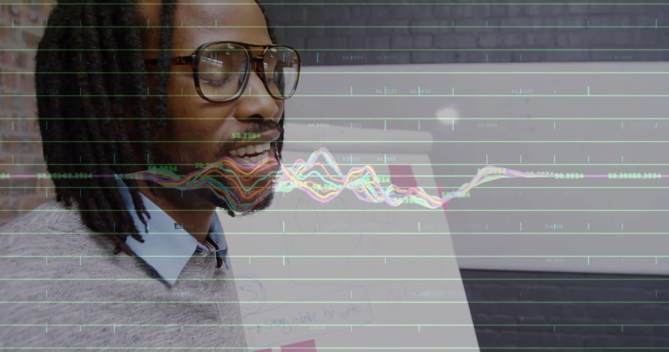 Male analyst starting by flipchart, creating graph moving across face and explaining business data