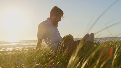 Young-woman-lying-on-mans-lap-and-interacting-with-each-other-4k