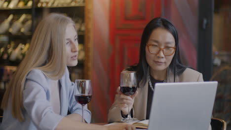 businesswomen meeting in a restaurant