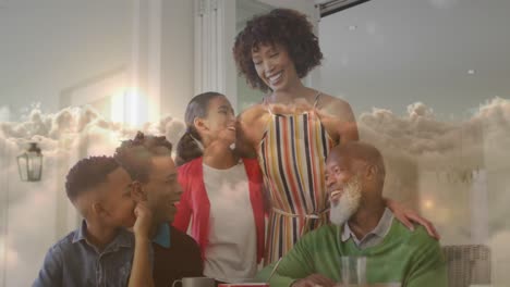 animación de una familia feliz y diversa abrazándose sobre las nubes