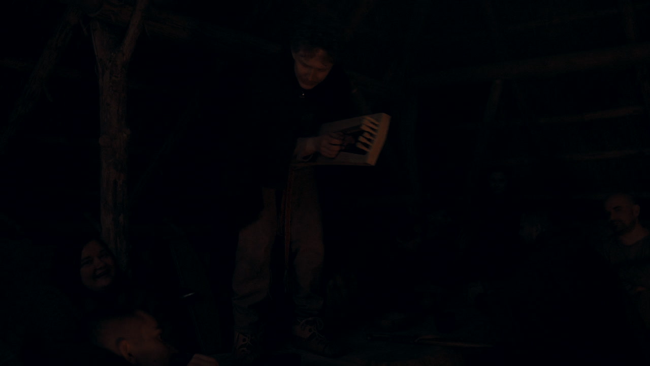 Night Gathering Around a Campfire