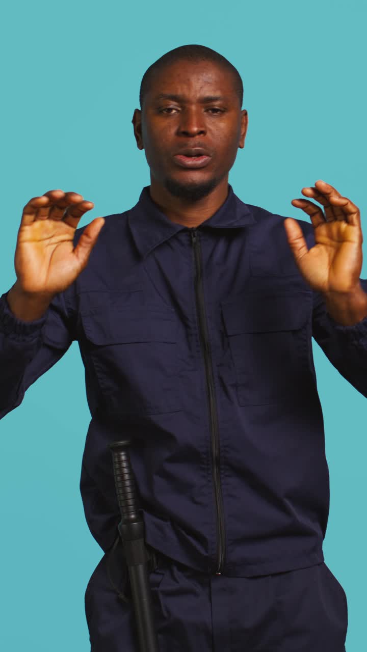 African American Security Guard Making Stop Gesture