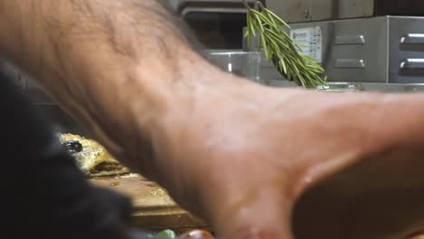 preparing a traditional turkish baked pide dish