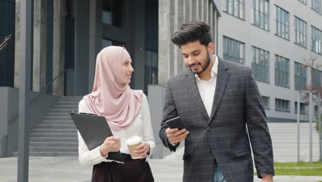 business colleagues discussing outdoors