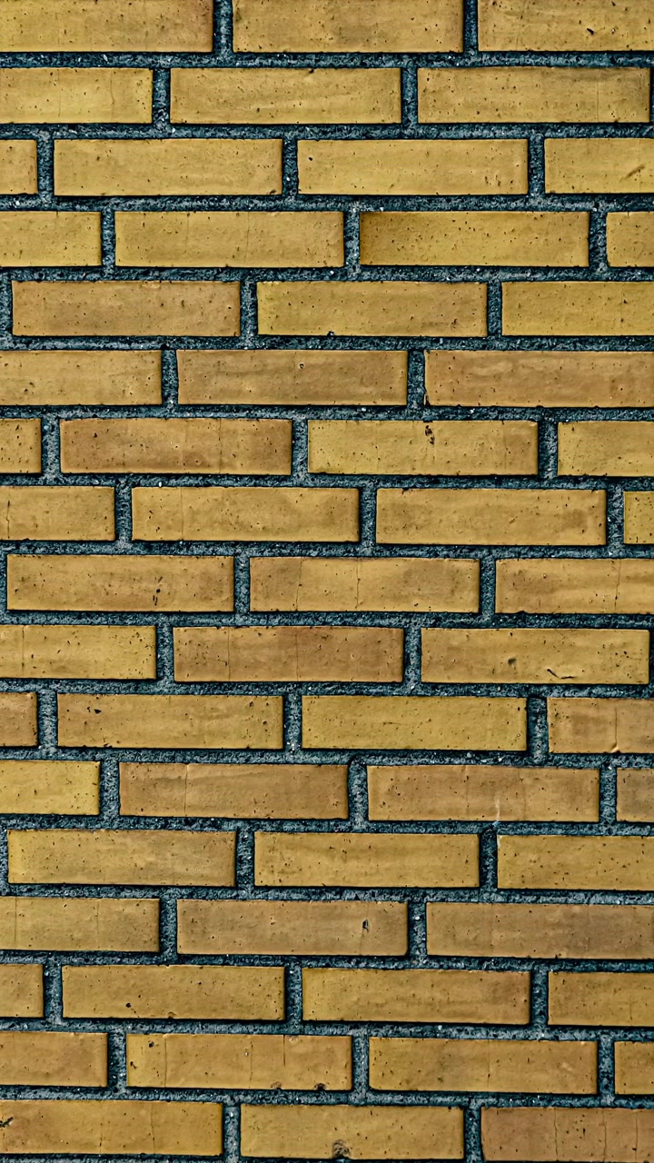 Yellow brick wall pattern texture