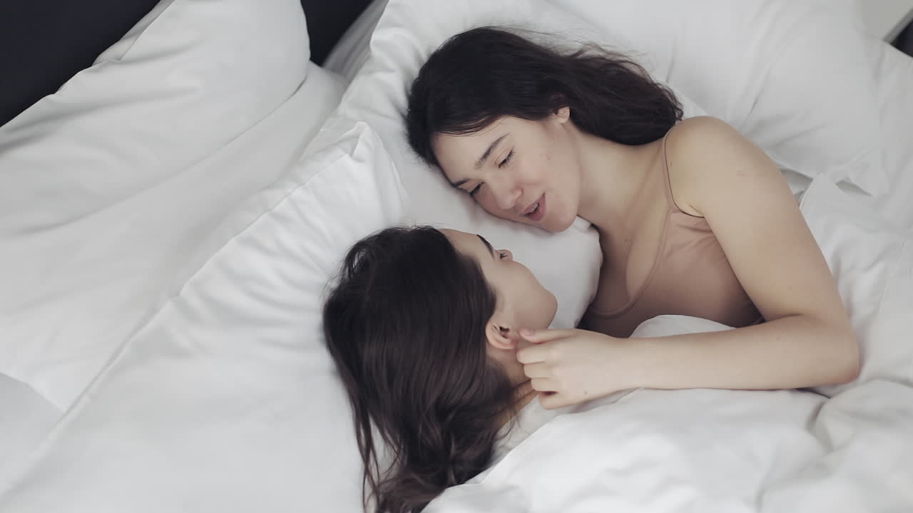 Lesbian couple in bed