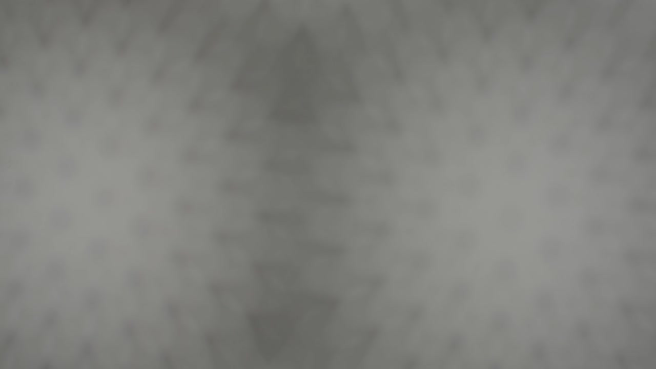 Two pieces of perforated metal plates form abstract moiré patterns