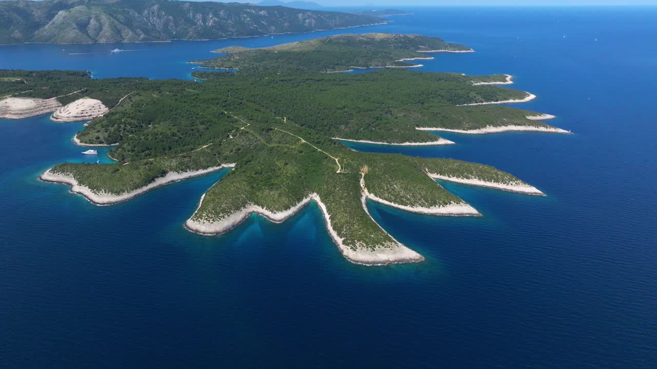 Pakleni Islands Covered With Green Trees Surrounded By Blue Sea In Adriatic Sea, Croatia. - aerial shot