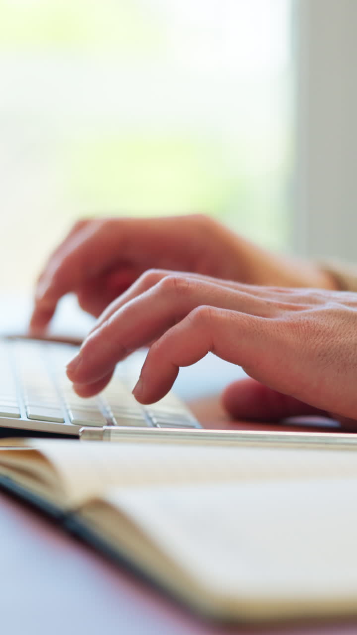 Close-Up of Hands Typing on a Computer Keyboard