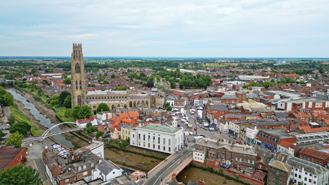 scenic beauty of Boston, Lincolnshire, in mesmerizing aerial drone footage: Port, ships, Saint Botolph Church , Saint Botolph's Bridge