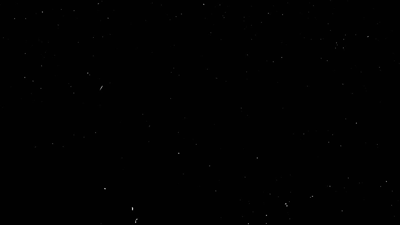 Vintage film effect with heavy dust, specks, and scratches on an isolated black background. Seamless loop for creating a retro or damaged film look. Use as an overlay for authentic texture