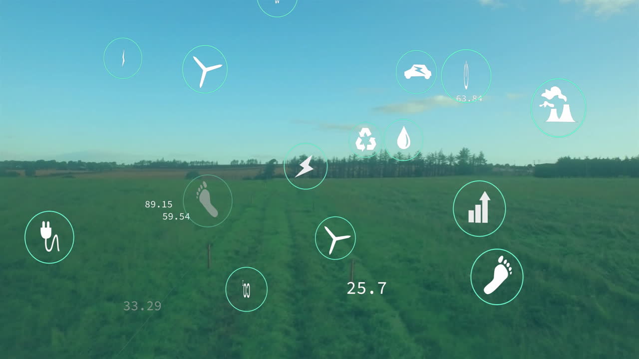 turbinas eólicas e íconos de energía animación sobre el paisaje de campo verde