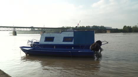 Boat-on-river-Sava-in-Brcko-district,-Bosnia-and-Herzegovina