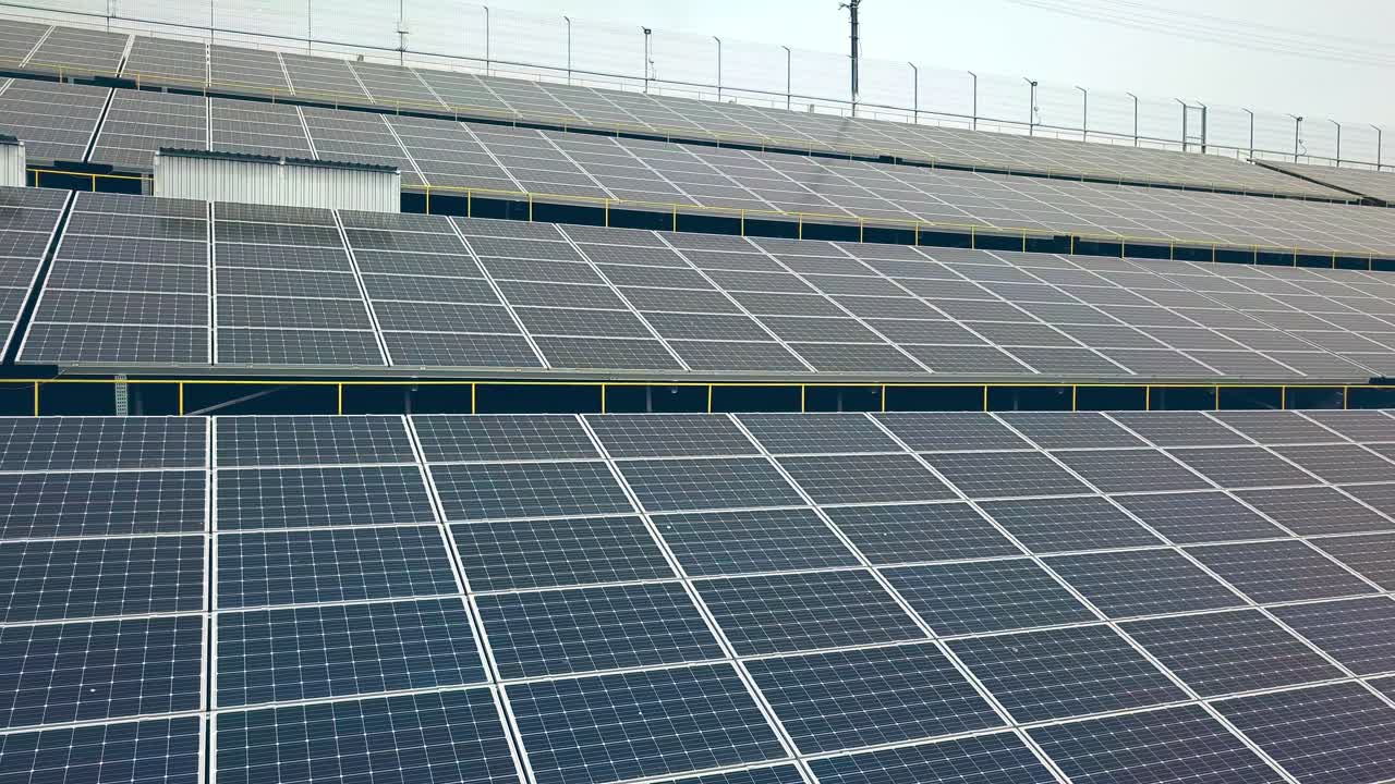 Solar energy farm. Power station. Blue solar panels. Source of ecological renewable energy.