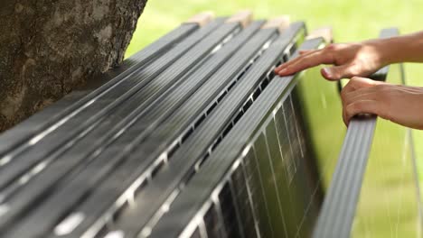 solar panel installer inspecting panels for installation to produce green power