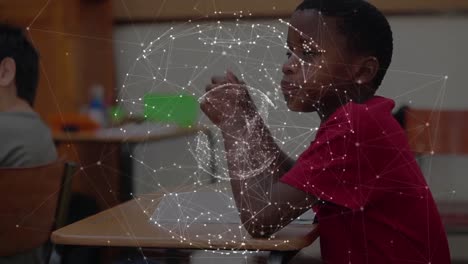 animation of globe with network of connections over schoolboy writing