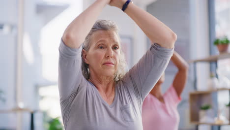 Active-senior-woman-meditating-during-a-fitness