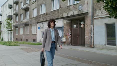 woman walking down a city street