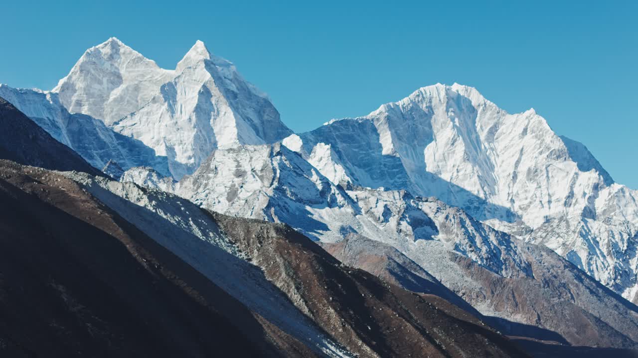 Breathtaking landscapes of the Everest region with snow-capped peaks, glacial rivers, and serene valleys along the iconic Base Camp trekking route in Nepal