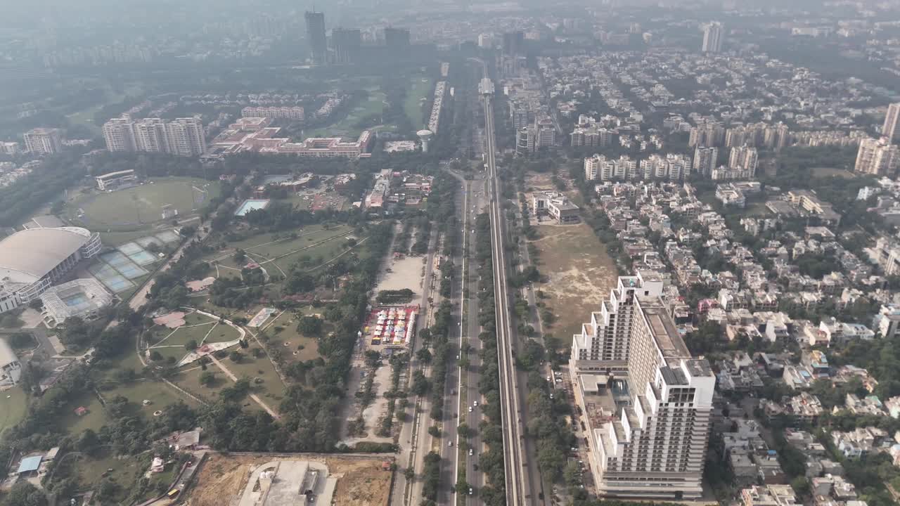 Greater Noida’s urban design combines expressways, tree canopies, and vertical living spaces in scenic aerial frames