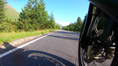 motorcycle tour in glencoe scotland highlands hills and trees