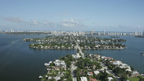 aerial perspective of luxury real estate island chains in miami, florida