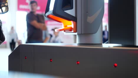 person scanning ticket at a gate