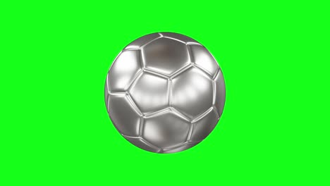 pelota de fútbol plateada en la pantalla verde